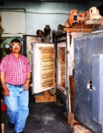 Hasan Eminaga showing an empty kiln